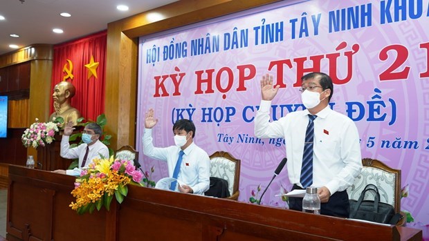 Đại biểu Hội đồng nh&acirc;n d&acirc;n tỉnh T&acirc;y Ninh kh&oacute;a IX, nhiệm kỳ 2016-2021 th&ocirc;ng qua c&aacute;c Nghị quyết. (Ảnh: Thanh T&acirc;n -TTXVN)