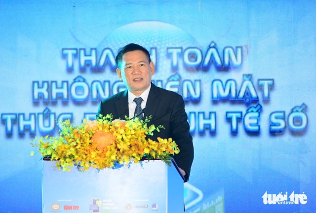 Ph&oacute; Thủ tướng Hồ Đức Phớc cho rằng: Khi ph&aacute;t triển thương mại điện tử th&igrave; đương nhi&ecirc;n phải thanh to&aacute;n kh&ocirc;ng tiền mặt. (Ảnh: TTO)