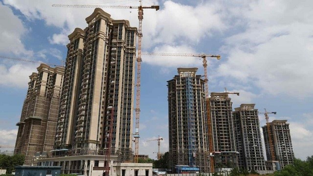 "Bom nợ" Evergrande bất ngờ thông tin sẽ tái khởi động 46 dự án bất động sản trên khắp Trung Quốc - Ảnh 2