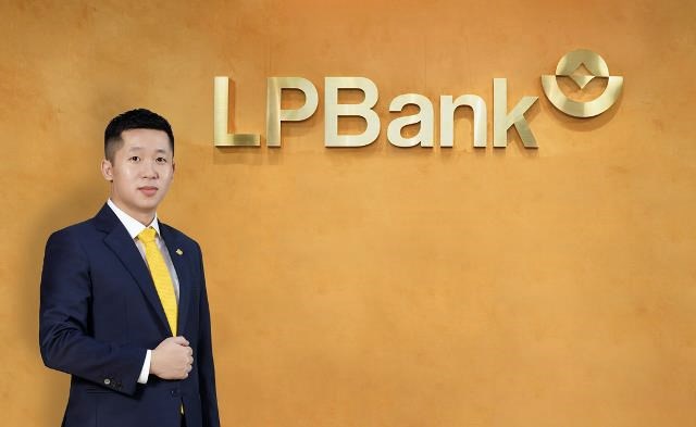 Ch&acirc;n dung &ocirc;ng Vũ Quốc Kh&aacute;nh &ndash; Tổng Gi&aacute;m đốc Ng&acirc;n h&agrave;ng Lộc Ph&aacute;t Việt Nam (LPBank).