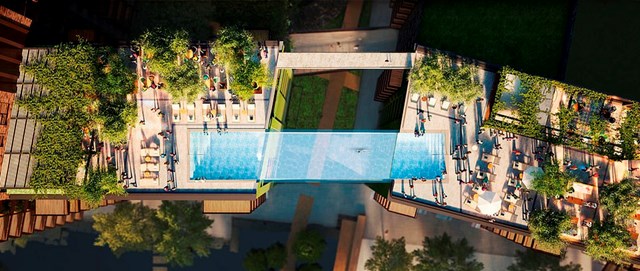 Nằm c&aacute;ch mặt đất 35m, nối liền hai t&ograve;a chung cư mới của Embassy Gardens giữa trung t&acirc;m London l&agrave; bể bơi Sky Pool, nơi cho bạn trải nghiệm cảm gi&aacute;c bay giữa kh&ocirc;ng trung.